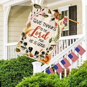 Outdoor porch display of a double-sided linen garden flag with maple leaves and pumpkin