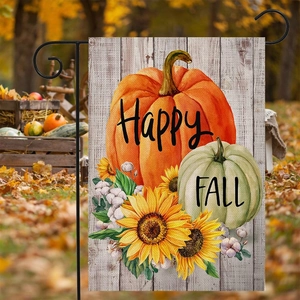 Detailed view of harvest garden flag with Happy Fall text, orange pumpkin and sunflowers