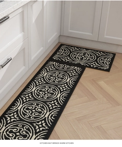 L-shaped kitchen mat set with vintage geometric patterns on wood floor by white cabinets