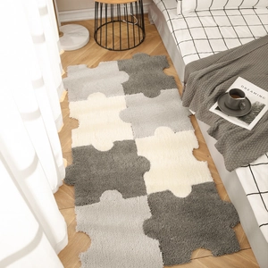 Modern puzzle plush carpet in grey and cream for minimalist bedroom and living room decor