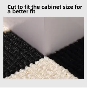 Detail of DIY trimmable Nordic kitchen mat showing thick woven texture near cabinet legs