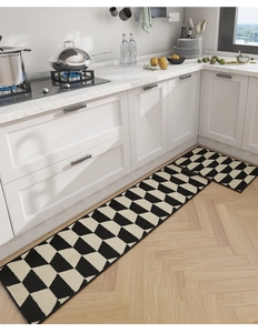 Detail of Nordic kitchen mat set with 3D geometric weave on light wood floor