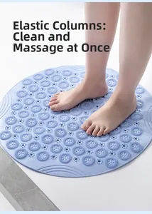 Detail view of light blue round silicone non-slip mat with massaging bristles for bathroom use