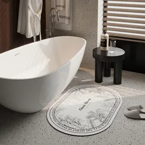Oval diatom mud bath mat with black botanical pattern and Own Story typography