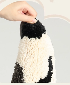 Close-up of thick plush panda bathroom mat showing soft texture and high density material