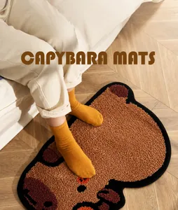 Close-up of thick plush Capybara bath mat with soft tufted texture on wooden floor