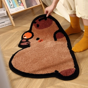 Cute Capybara bathroom mat made of thick plush tufted fabric on light wood floor
