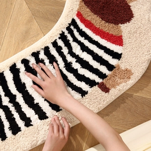 Cute cartoon puppy bedside rug with soft flocked texture on natural wood floor