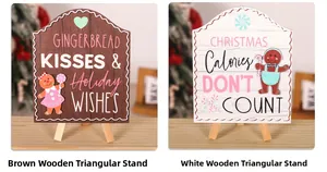 Detail of wooden Christmas gingerbread man signs with holiday quotes and mini easels