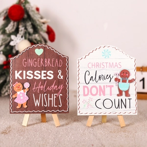 Christmas wooden gingerbread man tabletop signs with easel stands and holiday greetings