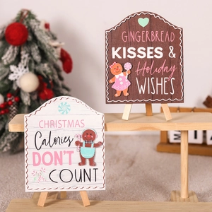 Christmas gingerbread man wooden table signs with holiday slogans and mini easels