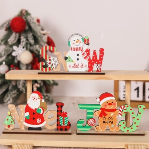 Three-piece set of wooden Christmas table signs featuring SNOW, Noel, and JOY designs