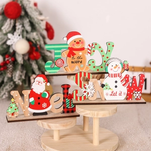 Christmas wooden tabletop decorations featuring Santa, snowman, and gingerbread man motifs