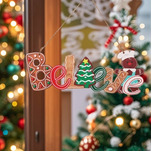 Wooden Believe Christmas sign with gingerbread man and festive tree hanging ornament