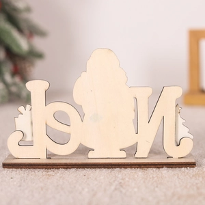 Close-up of wooden Noel letter ornament with Santa silhouette and tabletop base