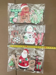 Three-piece wooden Christmas signs JOY SNOW NOEL with festive painted figures 20cm width