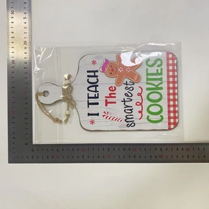 Wooden gingerbread teacher sign with measuring ruler showing 20x13cm size detail