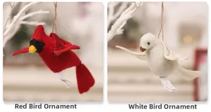 Detail of felt bird ornaments in red and white with rustic twine for home decor