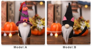 Detail view of Halloween gnome figurines with purple witch hat and black cat ears