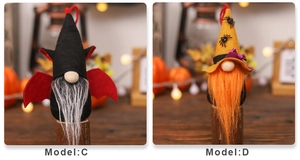 Detail of Halloween gnome figurines featuring vampire bat wings and witch spider hat styles