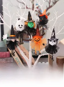 Detailed view of Halloween plush hanging ornaments with pumpkins, ghosts and bells