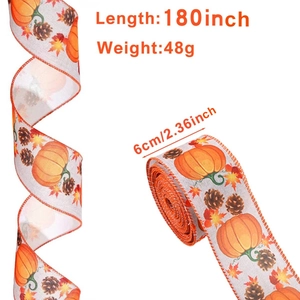 Detail of Harvest Festival linen ribbon with pumpkin, maple leaf, and pinecone patterns