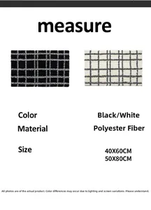Detail of checkered polyester bathroom mat with non-slip texture in black and white