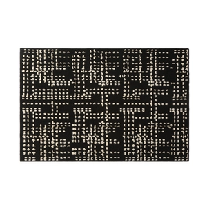 Modern black rectangle entryway mat with cream white geometric grid pattern