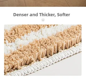 Macro view of dense, thick fiber texture and reinforced edging on the striped bedside rug