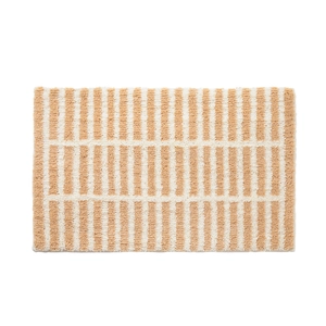 Minimalist beige and white striped plush bedroom rug with soft flocking texture
