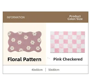 Detail view of plush flower bath mats in purple floral and pink checkered designs