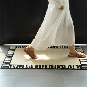 French style minimalist rectangular faux wool rug with black and white border