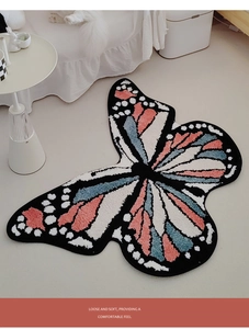 Detail of soft tufted butterfly rug with colorful patterns in a cozy bedroom setting