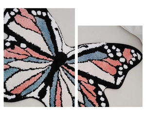 Detailed close-up of butterfly shaped plush rug texture and colorful tufted material