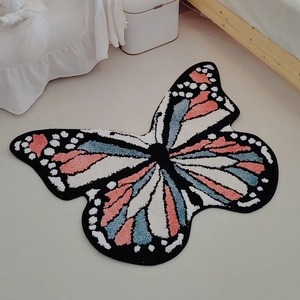 Thick butterfly shaped tufted rug for bedroom decor with pink and blue floral wing patterns