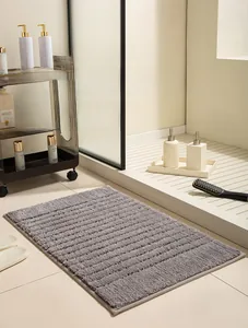 Thickened fluff texture of gray absorbent bathroom mat with striped non-slip design