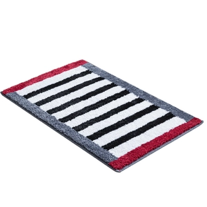 Modern black and white striped plush bedroom rug with bold red borders and anti-slip backing