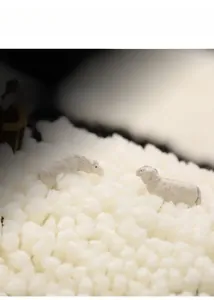 Macro shot of fluffy white bath mat showing thick plush texture and soft flocking