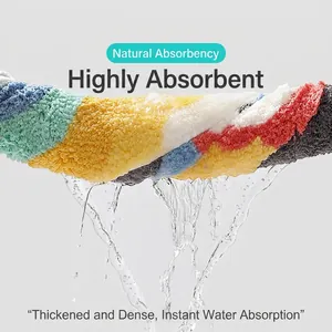 Absorbent multi-color plush bath mat with thick fiber construction for instant water soaking