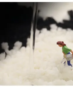 Macro detail of dense fibers on white absorbent bath mat with micro scenic watering effect