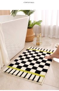 Detail of checkered bath mat with soft flocking fiber texture and anti-slip edge