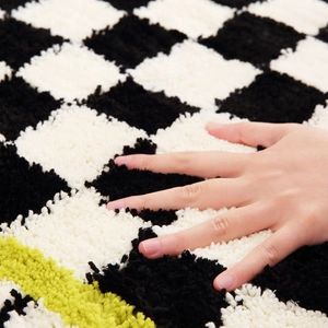 Lime green and black checkered bath mat with soft high-density plush texture