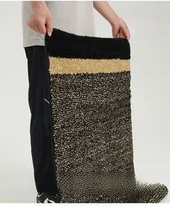 Close-up of thick non-slip doormat showing durable fiber texture and flexible material