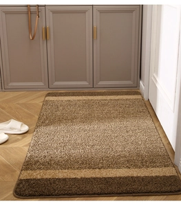 Detailed close-up of thickened striped entry mat with durable non-slip tufted texture