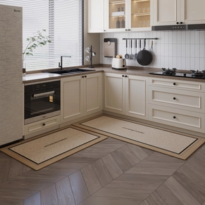 Waterproof kitchen floor mat set in beige with black borders for modern home cooking