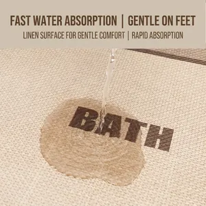 Linen woven bath mat with BATH print showing quick water absorption and soft texture