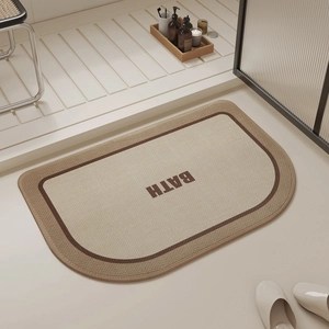 Semicircle linen texture bathroom mat with BATH text in beige and brown tones
