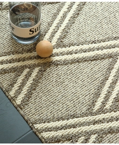 Detalle macro de la textura de bucle tejida y líneas geométricas en la alfombra de entrada