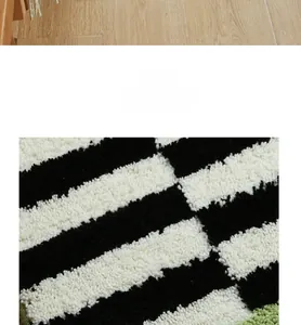 Close-up of thick plush shag rug with black and white stripes and soft texture