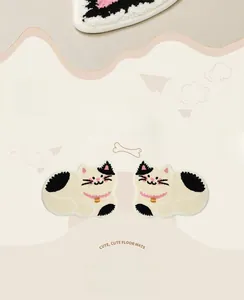 Detail of soft flocked cat bathroom mat showing 3D plush texture and cute bell design